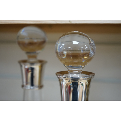 475 - A pair of modern silver collared glass decanters and stoppers, 31cm. Condition - fair to good