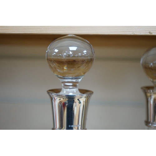 475 - A pair of modern silver collared glass decanters and stoppers, 31cm. Condition - fair to good