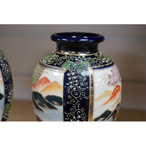 482 - A pair of Japanese Satsuma vases, 22.5cm. Condition - good