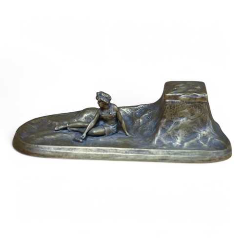 485 - An Art Nouveau bronze bathing lady inkwell, 26cm wide. Condition - good