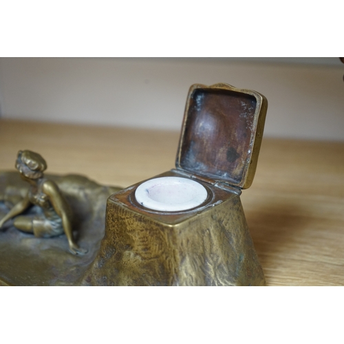 485 - An Art Nouveau bronze bathing lady inkwell, 26cm wide. Condition - good