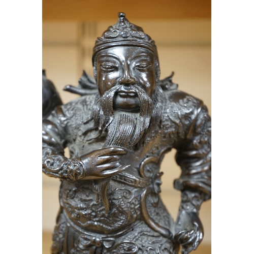 486 - A 20th century Chinese bronze figure of Guan Yu, 29cm. Condition - fair to good