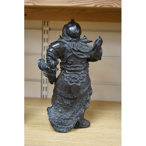 486 - A 20th century Chinese bronze figure of Guan Yu, 29cm. Condition - fair to good