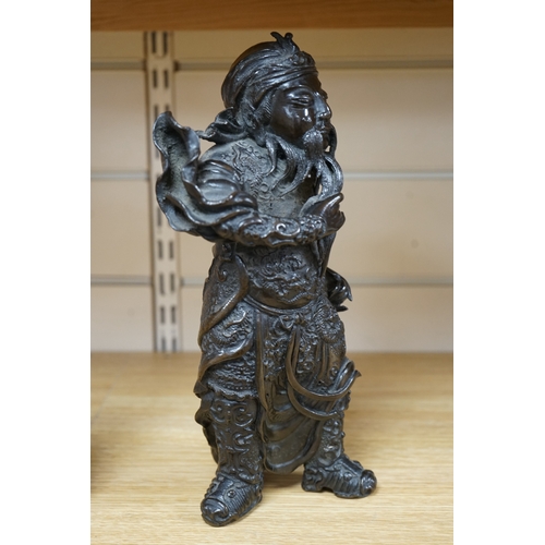 486 - A 20th century Chinese bronze figure of Guan Yu, 29cm. Condition - fair to good