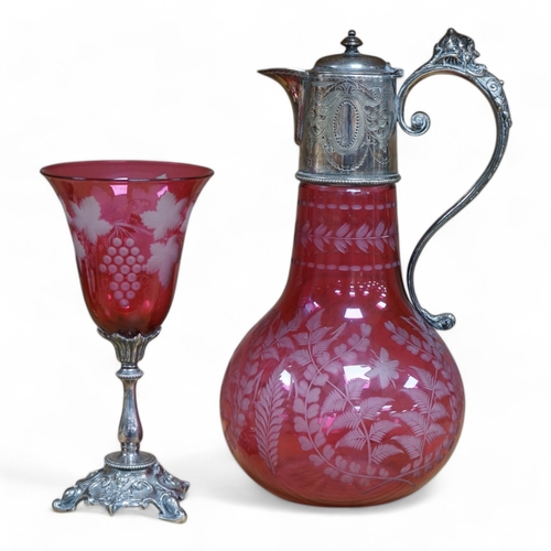 488 - A Victorian electroplate mounted cranberry glass claret jug and a similar goblet by Elkington & Co. ... 