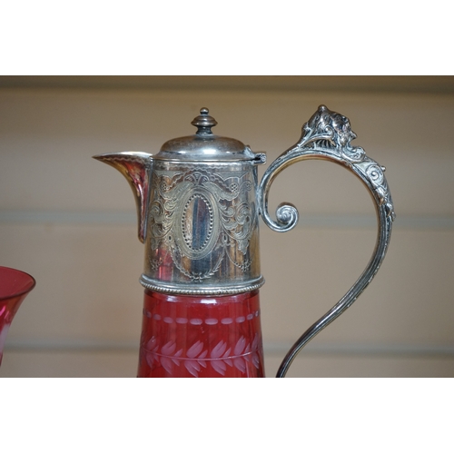 488 - A Victorian electroplate mounted cranberry glass claret jug and a similar goblet by Elkington & Co. ... 