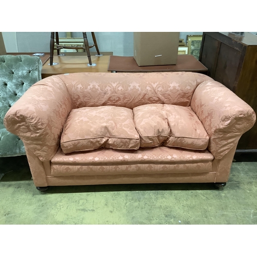 49 - An early 20th century upholstered drop arm Chesterfield settee, width 166cm, depth 90cm, height 74cm... 