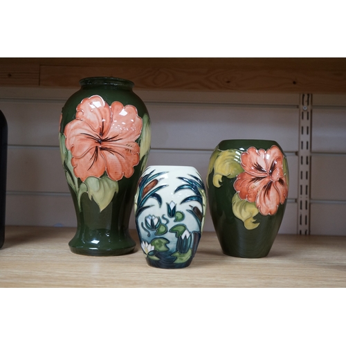 491 - Three 1990's Moorcroft vases, Hibiscus and Lamia pattern, tallest 26cm. Condition - good