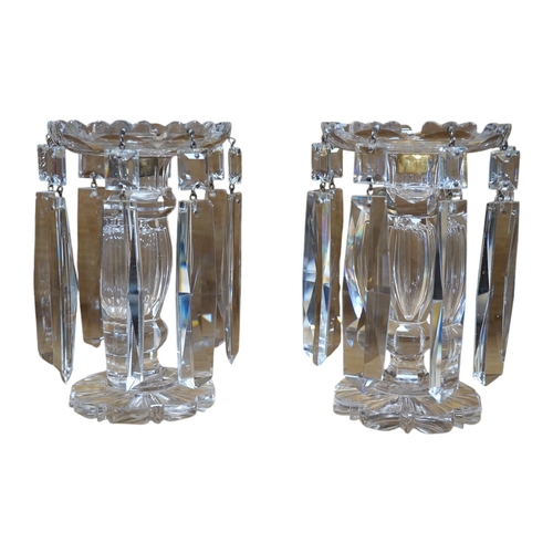 493 - A pair of glass lustre drop candlesticks, 18cm high. Condition - fair to good