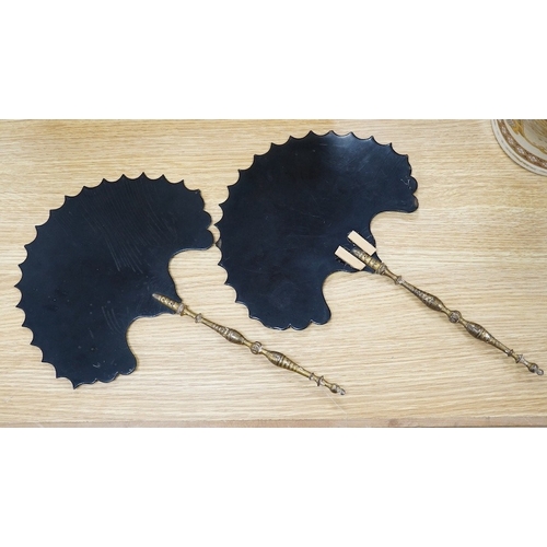 499 - A pair of 19th century papier mache face screens or fans, hand painted with figures, 39cm in length.... 