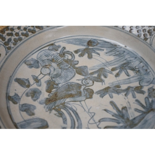 502 - A 17th century Binh Thuan shipwreck Blue and white dish, label to the base, 26cm in diameter. Condit... 