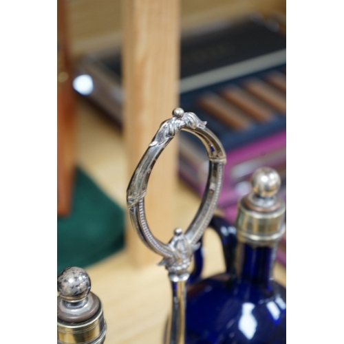 504 - A silver coaster and electroplate two bottle decanter stand, 32cm. Condition - fair to good