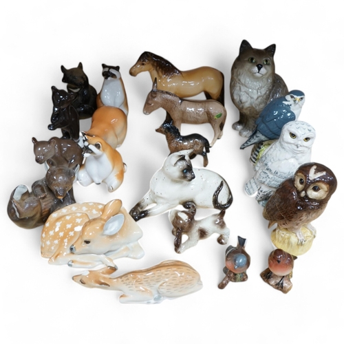 506 - A collection of Russian, Beswick, Doulton and other animal ornaments. Condition - varies