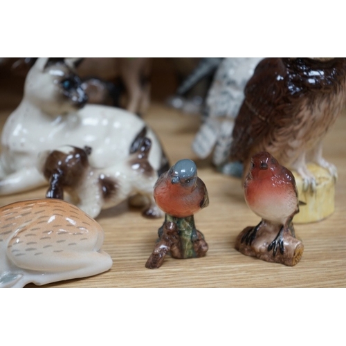 506 - A collection of Russian, Beswick, Doulton and other animal ornaments. Condition - varies