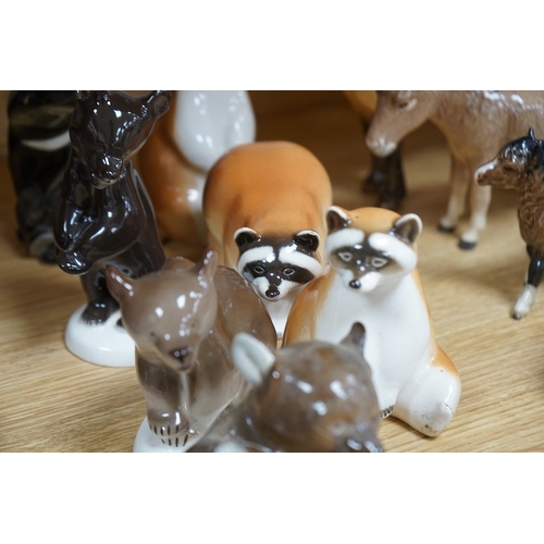 506 - A collection of Russian, Beswick, Doulton and other animal ornaments. Condition - varies