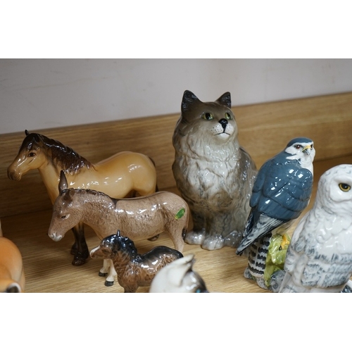 506 - A collection of Russian, Beswick, Doulton and other animal ornaments. Condition - varies