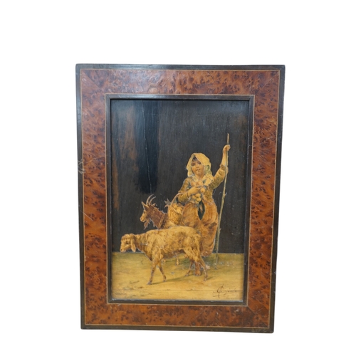 513 - An Italian burr walnut framed, parquetry panel of a girl carrying a basket of fruit surrounded by a ... 