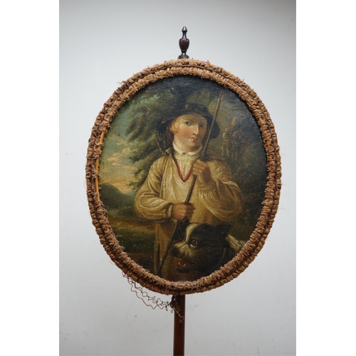 524 - An oval Regency fire screen painting of a shepherd boy with his dog and a painting verso of ephemera... 