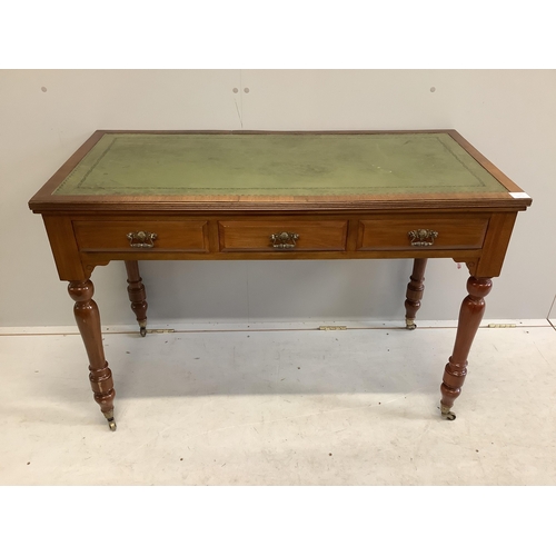 54 - A late Victorian mahogany three drawer writing table, with an inset leather top, width 113cm, depth ... 