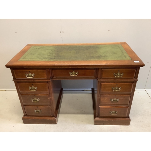 60 - A late Victorian mahogany kneehole pedestal desk, fitted nine small drawers, width 121cm, depth 59cm... 