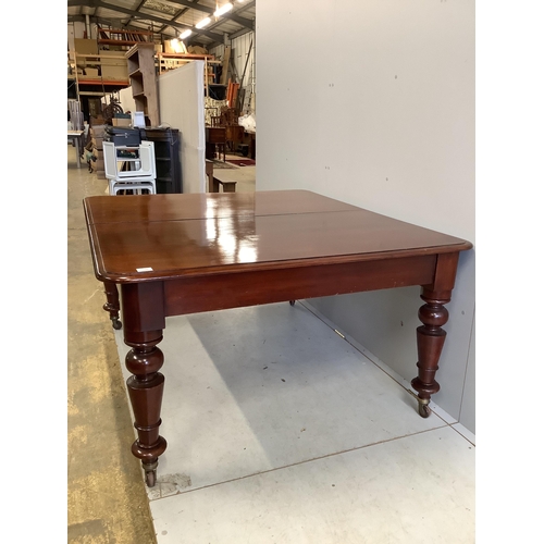 62 - A Victorian rectangular mahogany extending dining table, 280cm extended, three spare leaves, depth 1... 