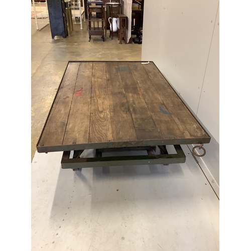 73 - An Industrial style cast iron and planked oak coffee table converted from a Second War British milit... 