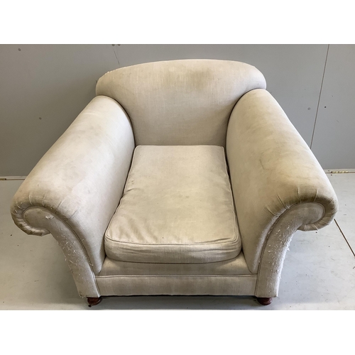 77 - A Howard style upholstered armchair, width 115cm, depth 110cm, height 78cm. Condition - fair, uphols... 