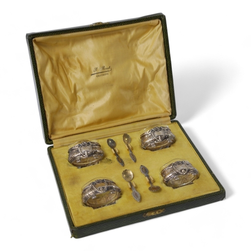 830 - A cased set of four late 19th/early 20th century French 800 standard white metal oval salts with gla... 