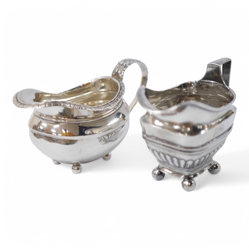 834 - Two George III silver cream jugs, one demi-fluted, with engraved inscription to the base, London, 18... 