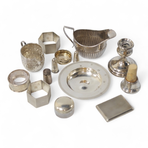 838 - Small silver including two cream jugs, one demi-fluted, Birmingham, 1894, a dish, a dwarf candlestic... 