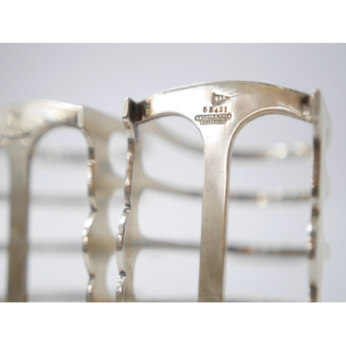 841 - A pair of George V silver five bar toast racks, by Walker & Hall, Sheffield, 1933, length 79mm, 8.5o... 