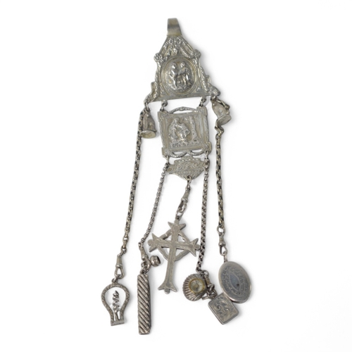 844 - A late 19th/early 20th century continental white metal chatelaine, hung with six assorted accoutreme... 