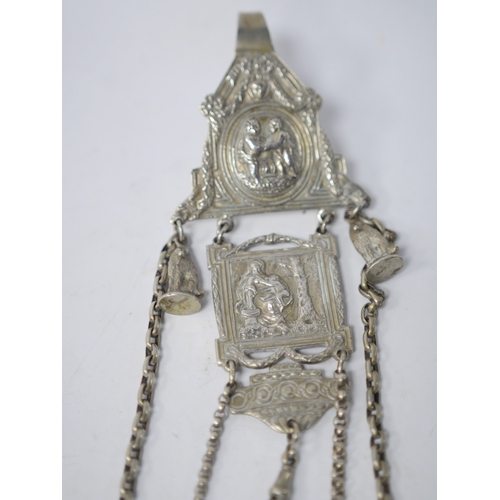 844 - A late 19th/early 20th century continental white metal chatelaine, hung with six assorted accoutreme... 