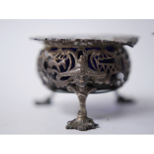 845 - A pair of early Victorian pierced silver circular salts, with mask knees and scroll pad feet, John W... 