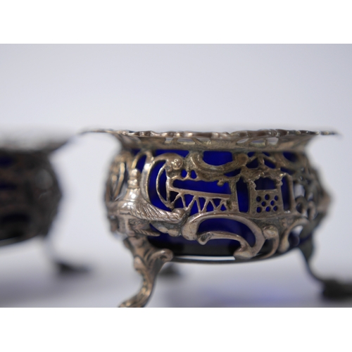 845 - A pair of early Victorian pierced silver circular salts, with mask knees and scroll pad feet, John W... 