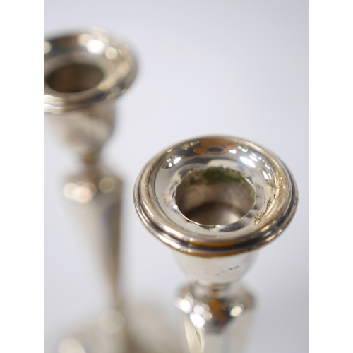 849 - A pair of George V silver candlesticks, Birmingham, 1921, 19.9cm, weighted. Condition - poor