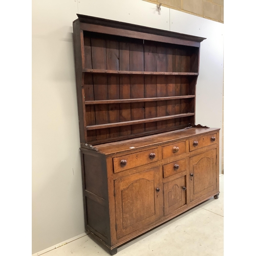 85 - A George III oak dresser with boarded rack, width 168cm, depth 46cm, height 204cm. Condition - poor,... 