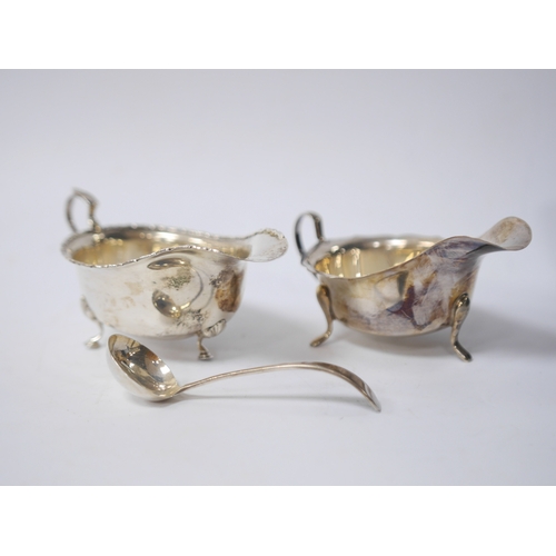 850 - A cased Elizabeth II silver sauce boat and spoon, by Viners Ltd, Sheffield, 1952/5 and one other sil... 