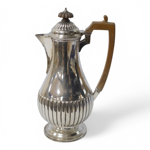 851 - A Victorian demi-fluted silver hot water pot by Charles Stuart Harris, London, 1891, 22.3cm, gross w... 