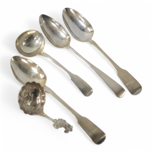 853 - A late 19th century continental silver caddy spoon, with figural terminal, import marks for Sheffiel... 