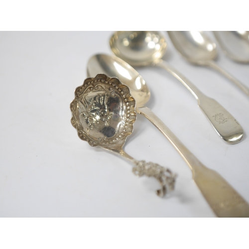 853 - A late 19th century continental silver caddy spoon, with figural terminal, import marks for Sheffiel... 