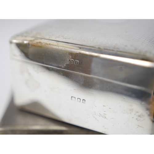 855 - An Art Deco silver mounted rectangular cigarette box, with engraved inscription, Birmingham, 1935, 1... 