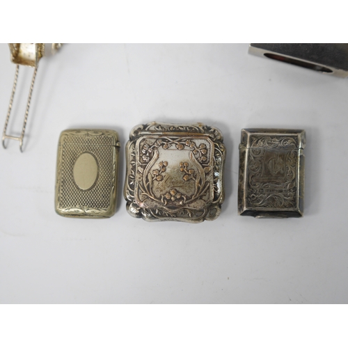 858 - Assorted small collectables including a late Victorian silver vesta case, Birmingham, 1898, a small ... 