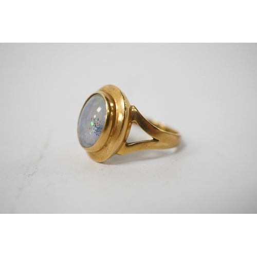 902 - A modern Italian 18k and opal doublet set ring, size N/O, gross weight 4.9 grams. Condition - fair t... 