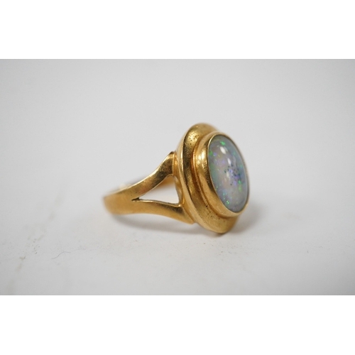 902 - A modern Italian 18k and opal doublet set ring, size N/O, gross weight 4.9 grams. Condition - fair t... 