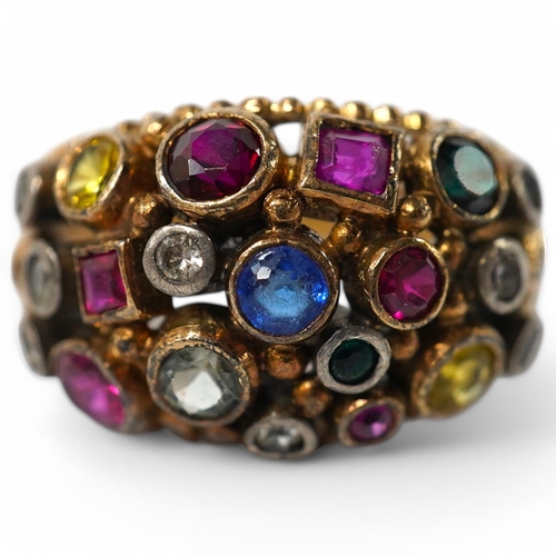 903 - A 1940's continental yellow metal and multi gem set cluster dress ring, size P, gross weight 6.6 gra... 