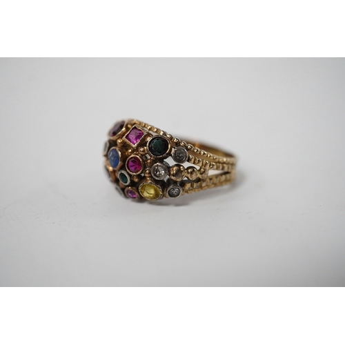 903 - A 1940's continental yellow metal and multi gem set cluster dress ring, size P, gross weight 6.6 gra... 