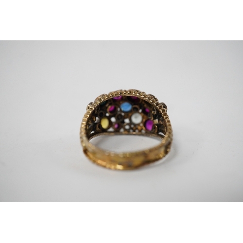 903 - A 1940's continental yellow metal and multi gem set cluster dress ring, size P, gross weight 6.6 gra... 