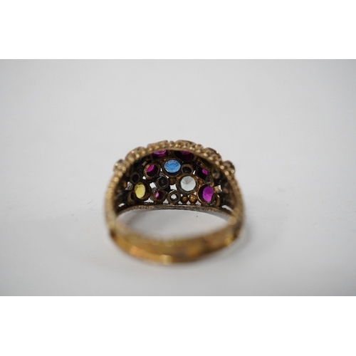 903 - A 1940's continental yellow metal and multi gem set cluster dress ring, size P, gross weight 6.6 gra... 