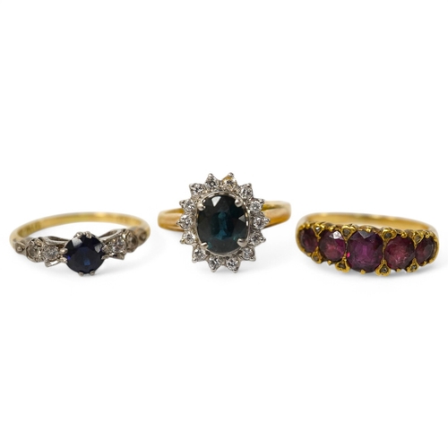 911 - A group of three rings, comprising: a sapphire and diamond cluster ring, size M1/2, stamped 14K and ... 